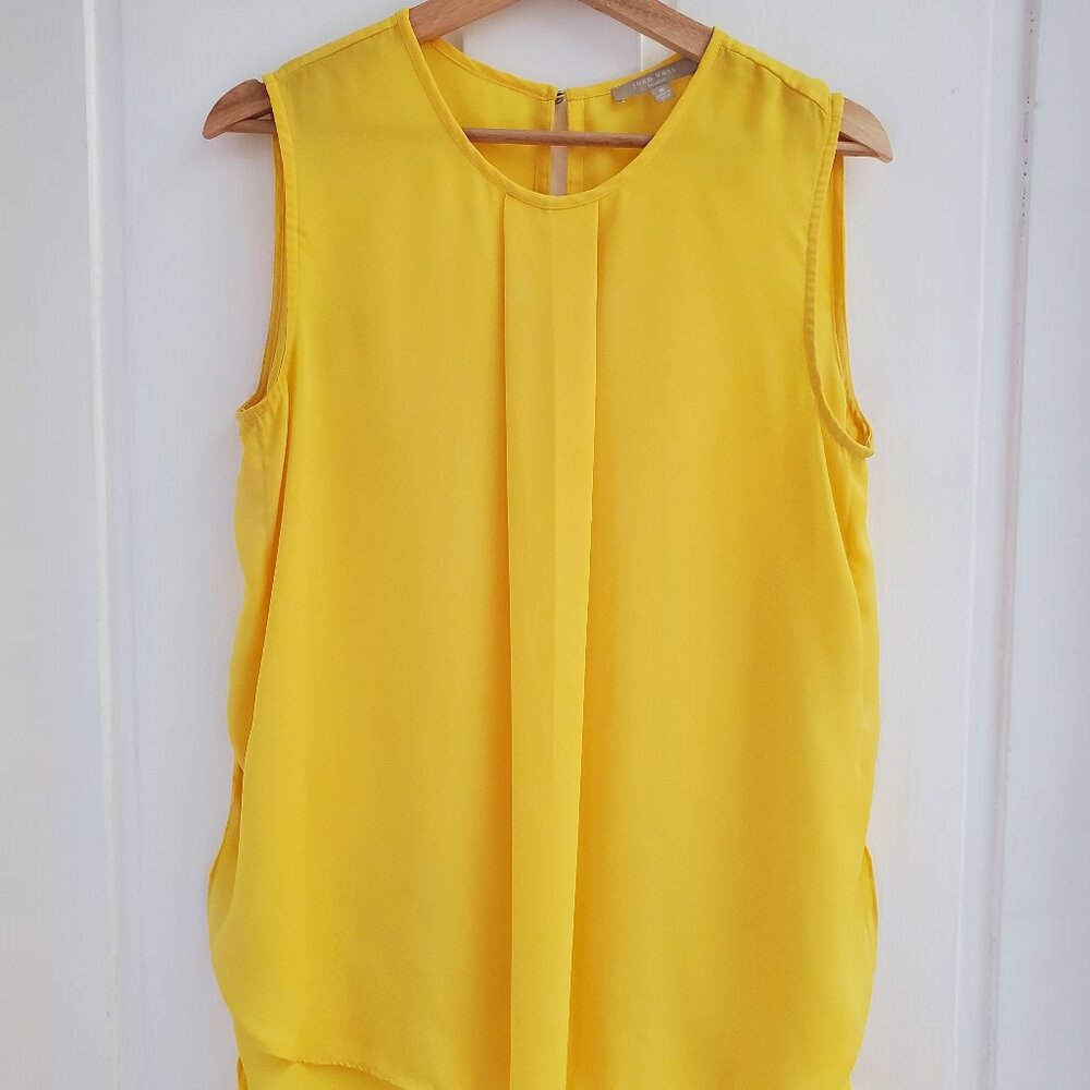 Bright yellow flowy blouse